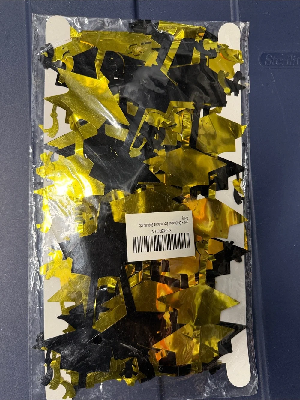 Graduation Cap Confetti Party Decorations - Gold and Black grad streamer hanging